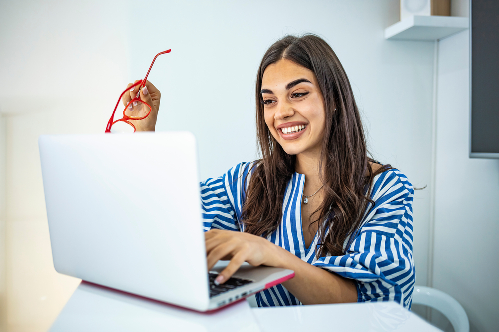 Woman sitting infront of her laptop